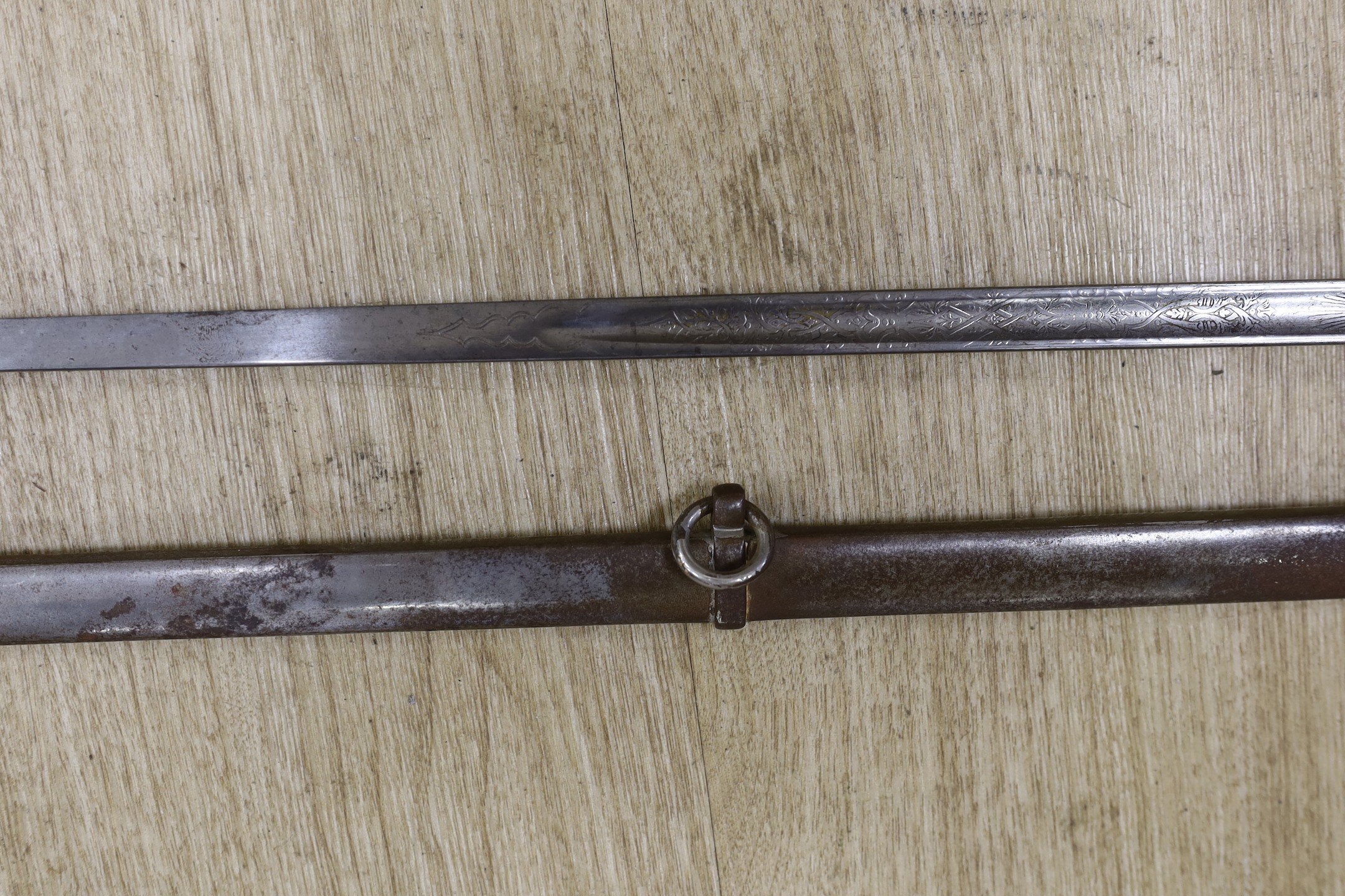 A George V officers sword with scabbard and a bayonet, sword100cm long